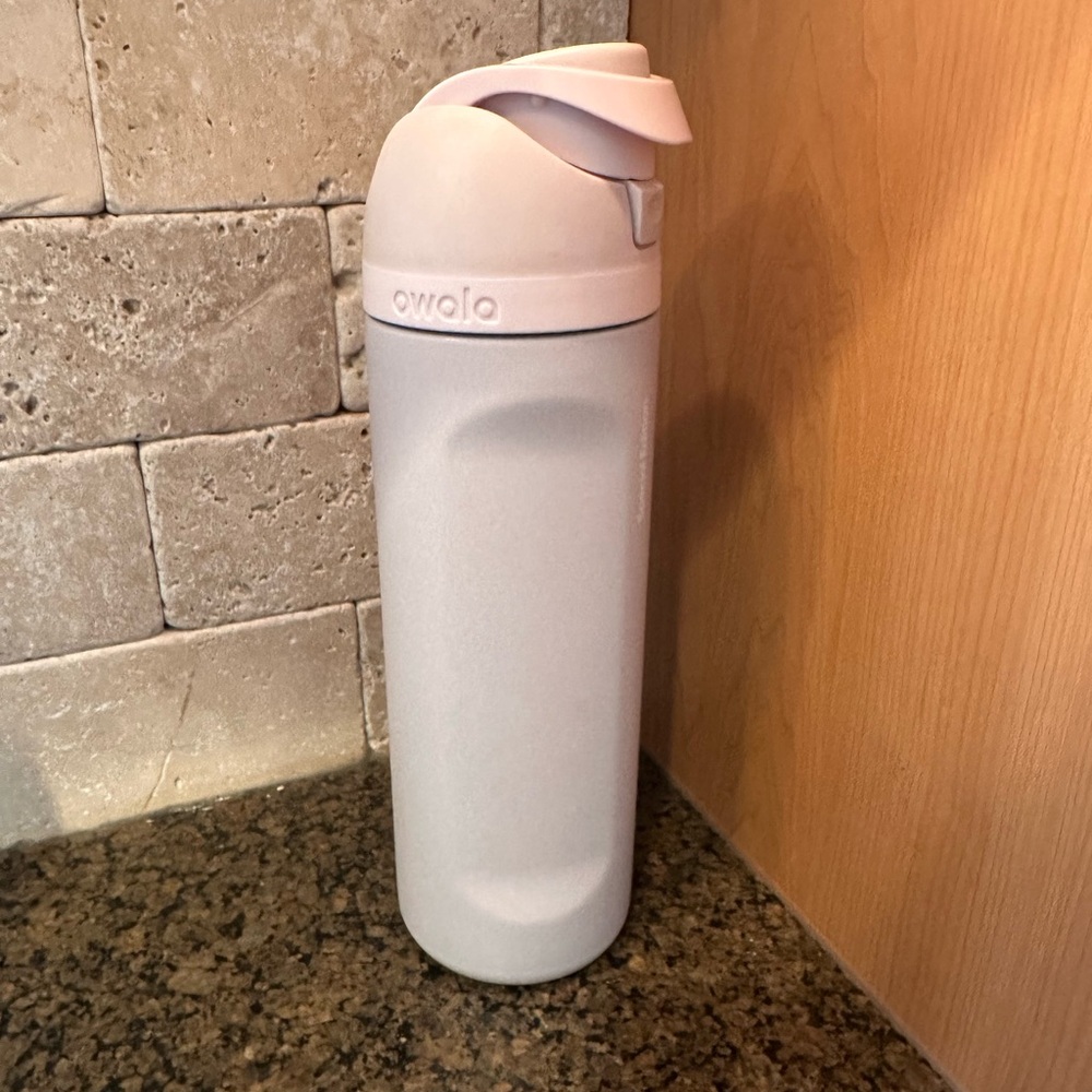 Light pink special edition Owala 24oz water bottle
